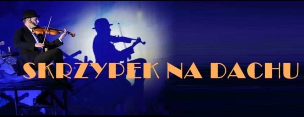 skrzypek-na-dachu-1024x396.jpg